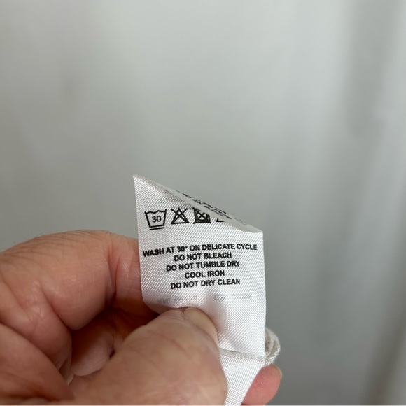 Ollari from Anthropologie cream animal print pull on pants high waisted - Picture 5 of 8